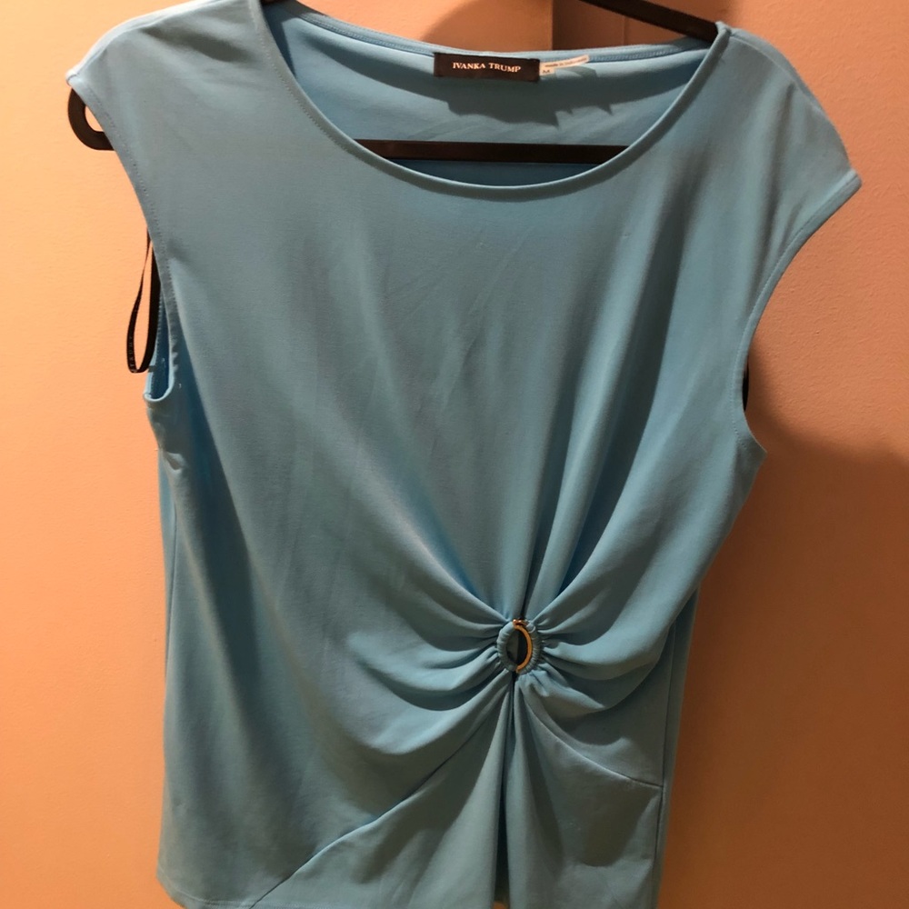 Light blue business casual blouse.